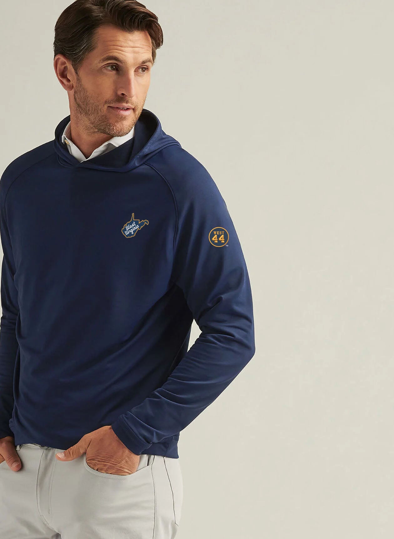 WVU Jerry West Peter Millar Pine Logo Performance Hoodie in Navy-State Script